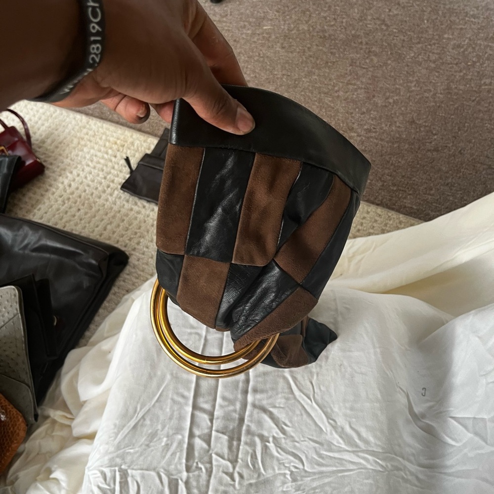 Chic Leather Patchwork Handbag With Gold Rings - image 1